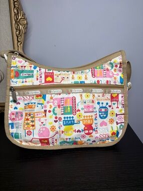 LeSportsac Multicolor Robot Love Print Crossbody with Tan Trim